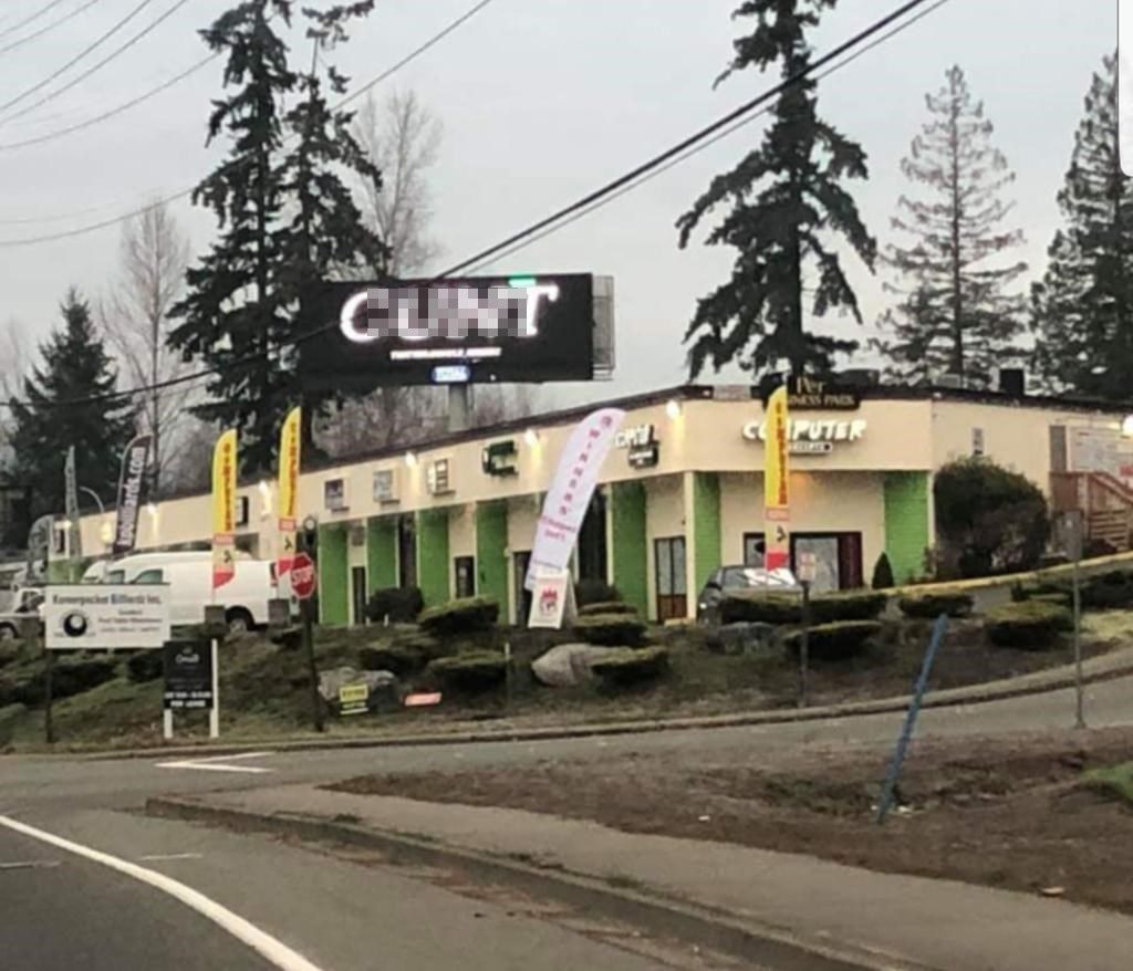 Mill Creek Sign Hacked