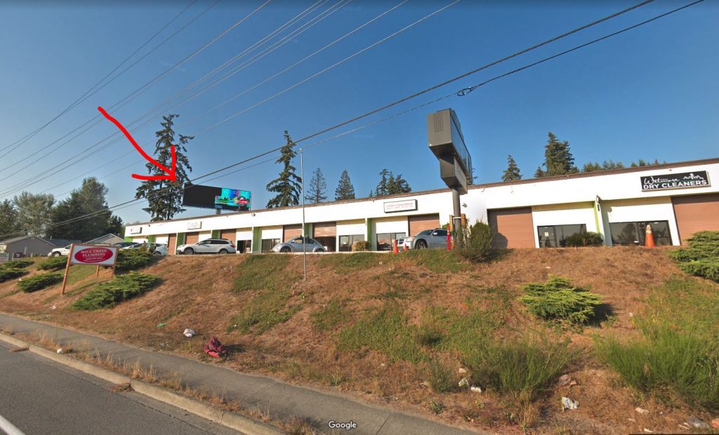 Mill Creek sign hacked